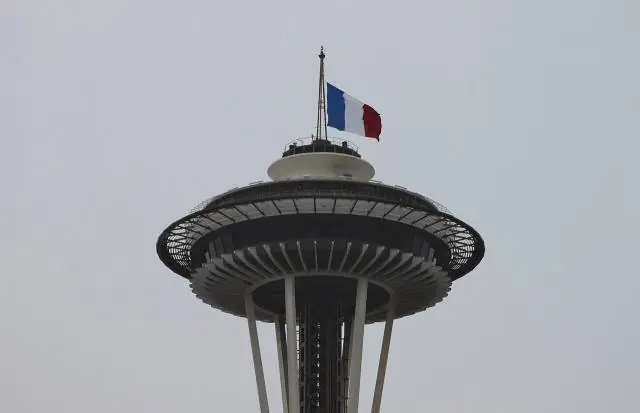 Space Needle flying the French flag at half-mast